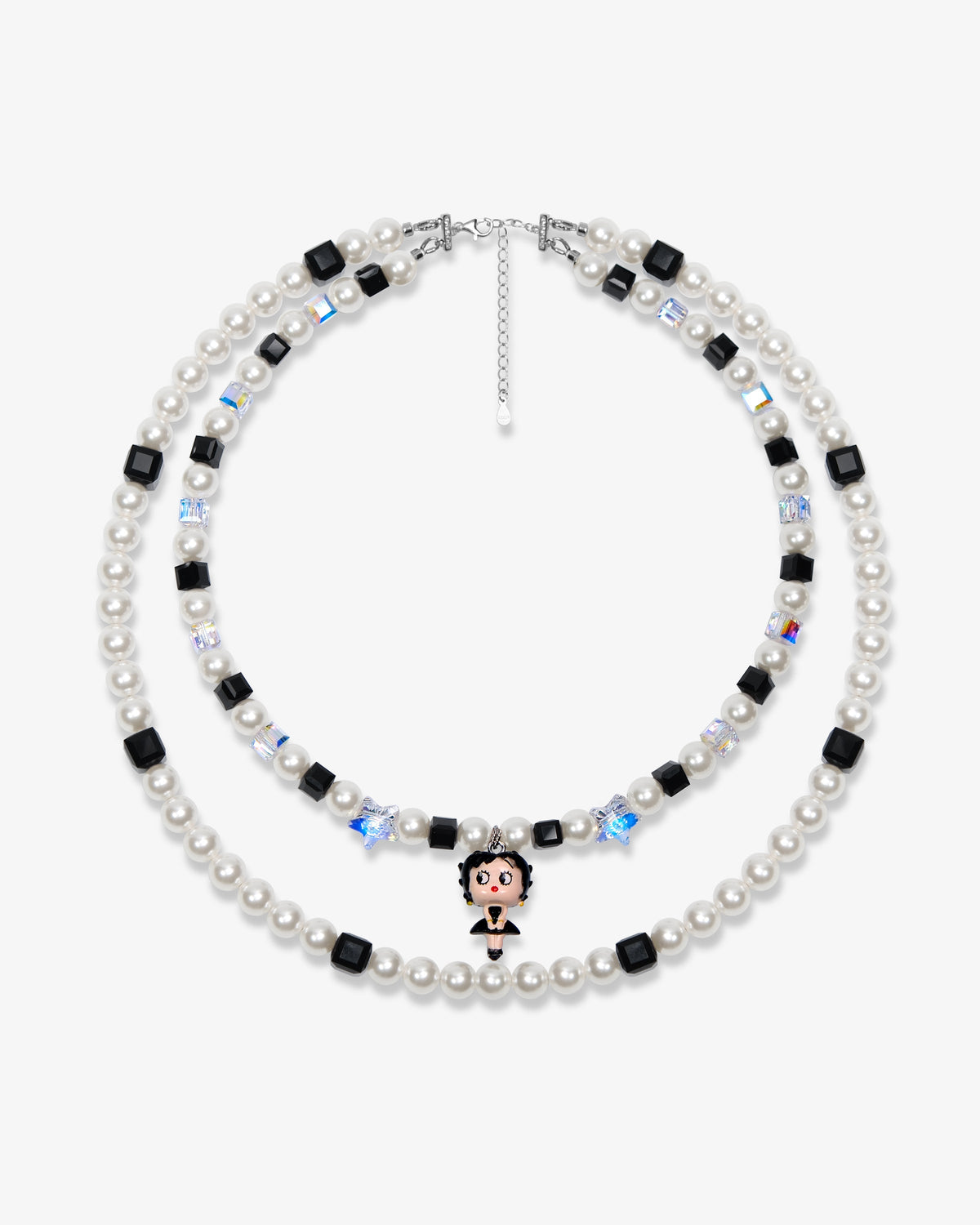 Two-strand white pearl and black crystal necklace with a small vintage character charm