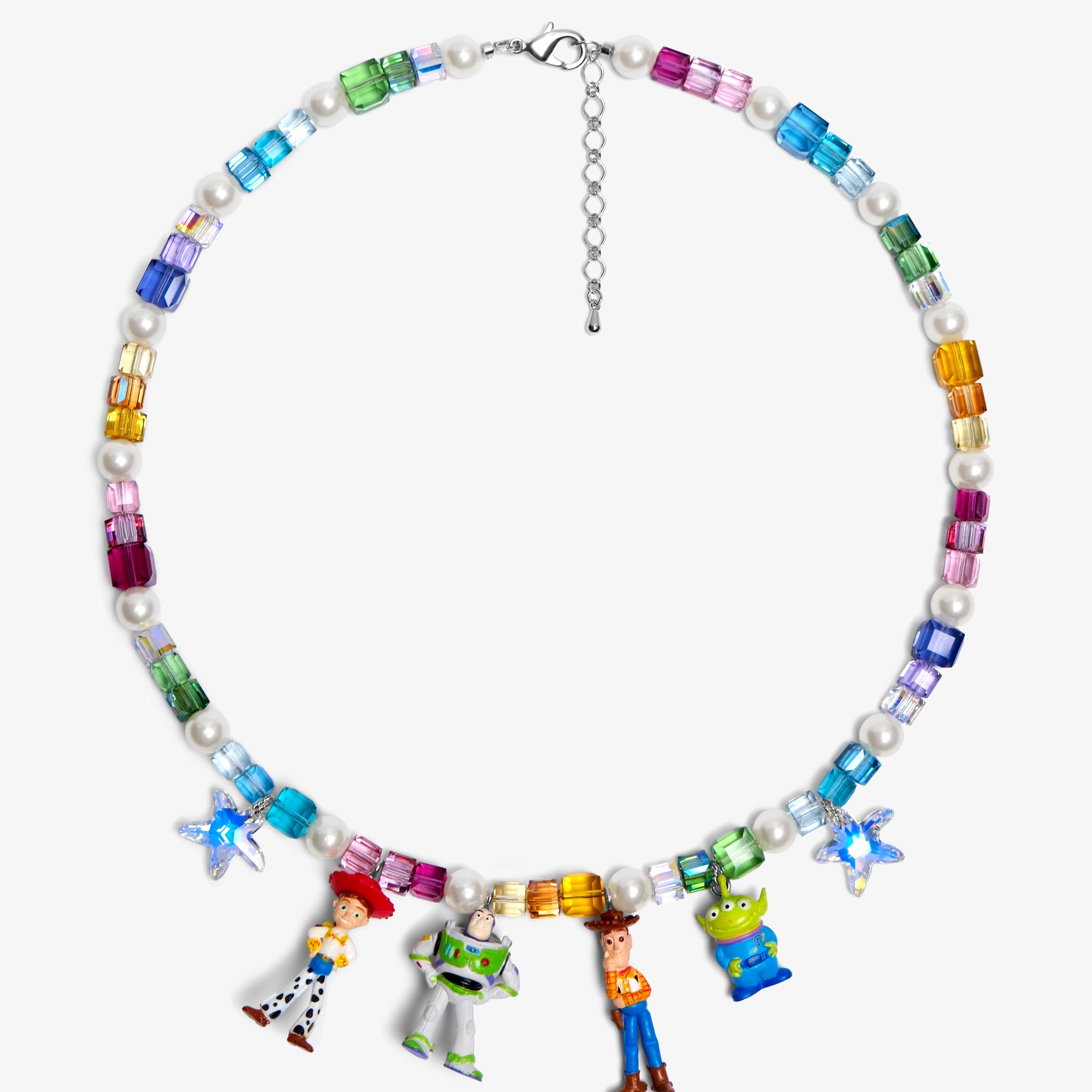 Rainbow crystal and pearl necklace with four vintage toy charms: a cowgirl, a space ranger, a cowboy and a green alien