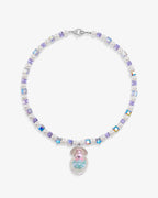 Handmade white and pastel Swarovski crystal and pearl charm necklace with shell pendant - flat lay