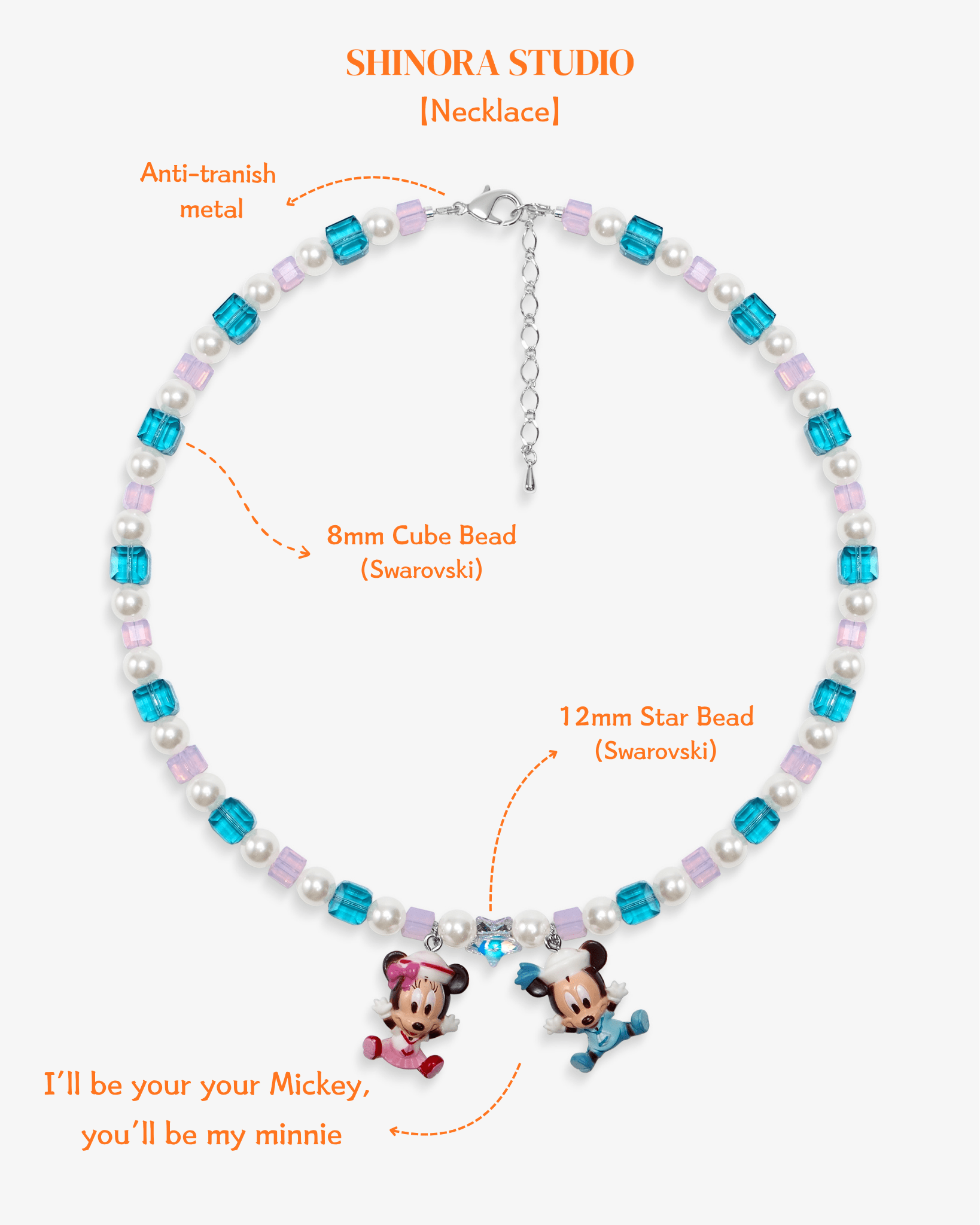 Close-up detail of Pastel Couple Charm Necklace · handmade Swarovski crystal jewelry