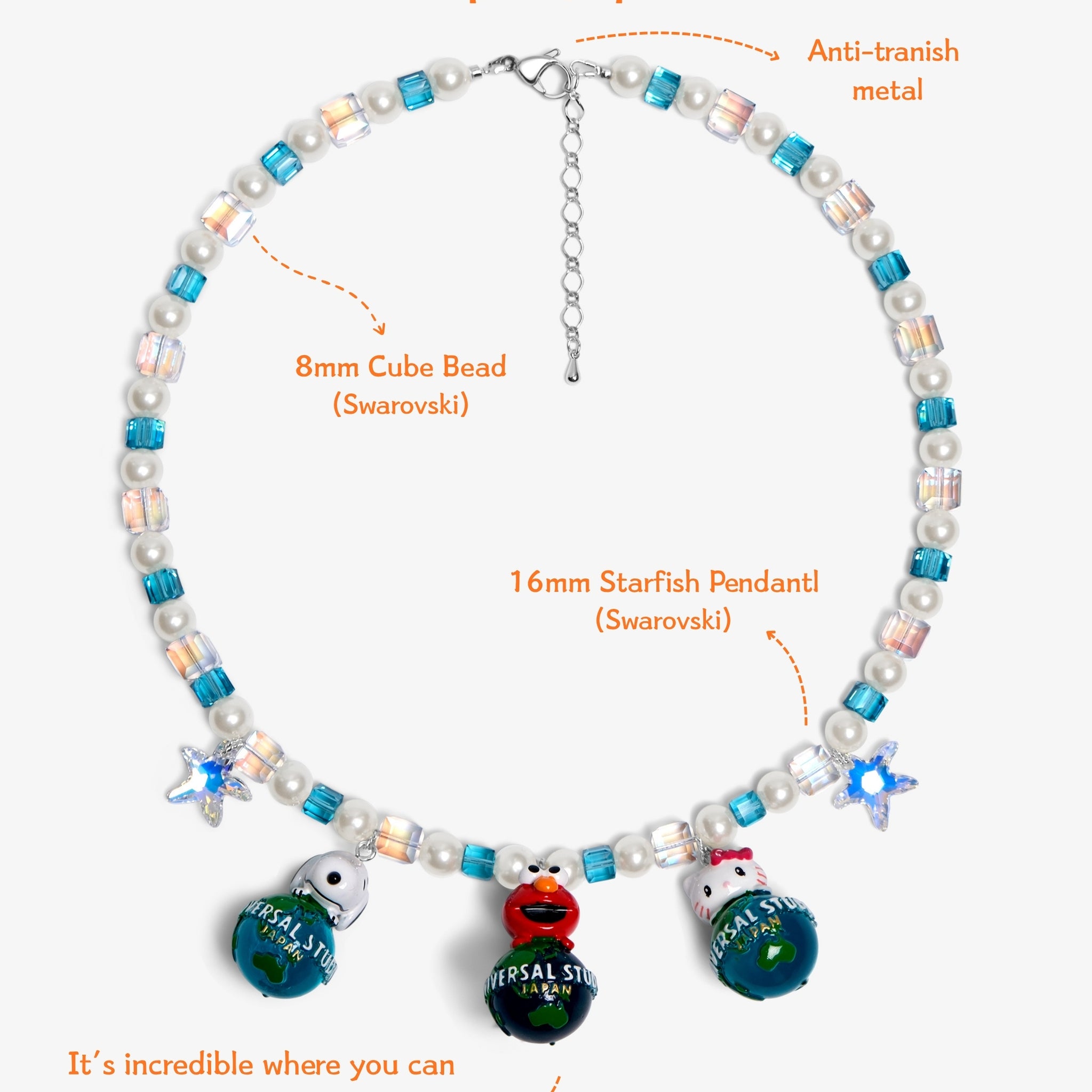 Close-up detail of Global Adventure Charm Necklace · handmade Swarovski crystal jewelry
