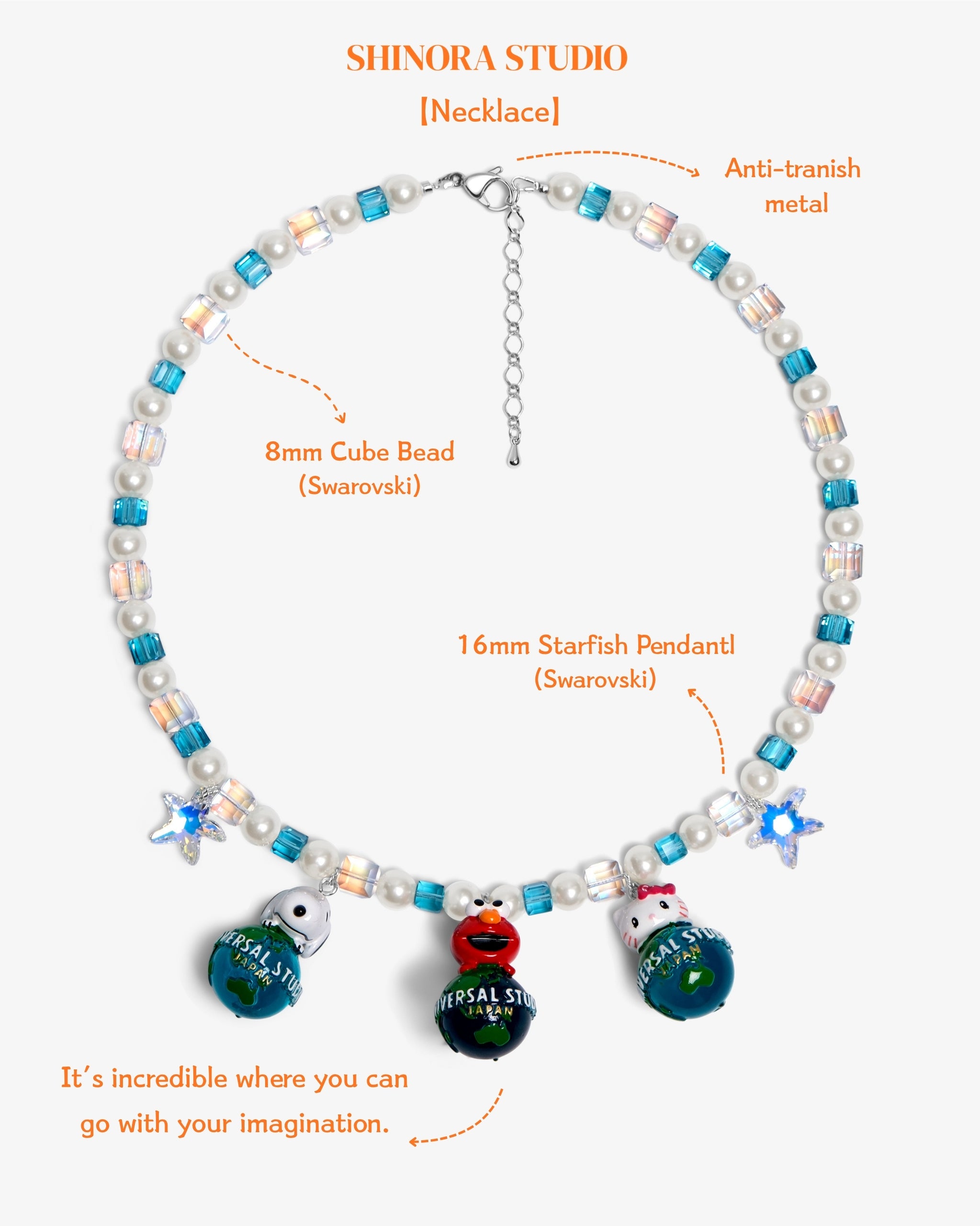 Close-up detail of Global Adventure Charm Necklace · handmade Swarovski crystal jewelry
