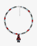 Handmade red and black Swarovski crystal and pearl charm necklace with vintage pendant - flat lay