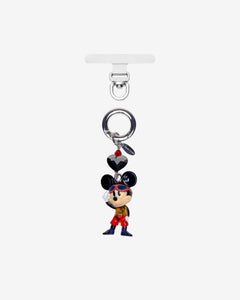 Black-eared mouse character phone charm in red trousers, with dark crystal accents and a silver attachment ring.