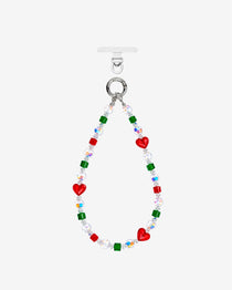 Red heart crystal phone chain with green and red cube beads, iridescent accents and silver-tone attachment rings.