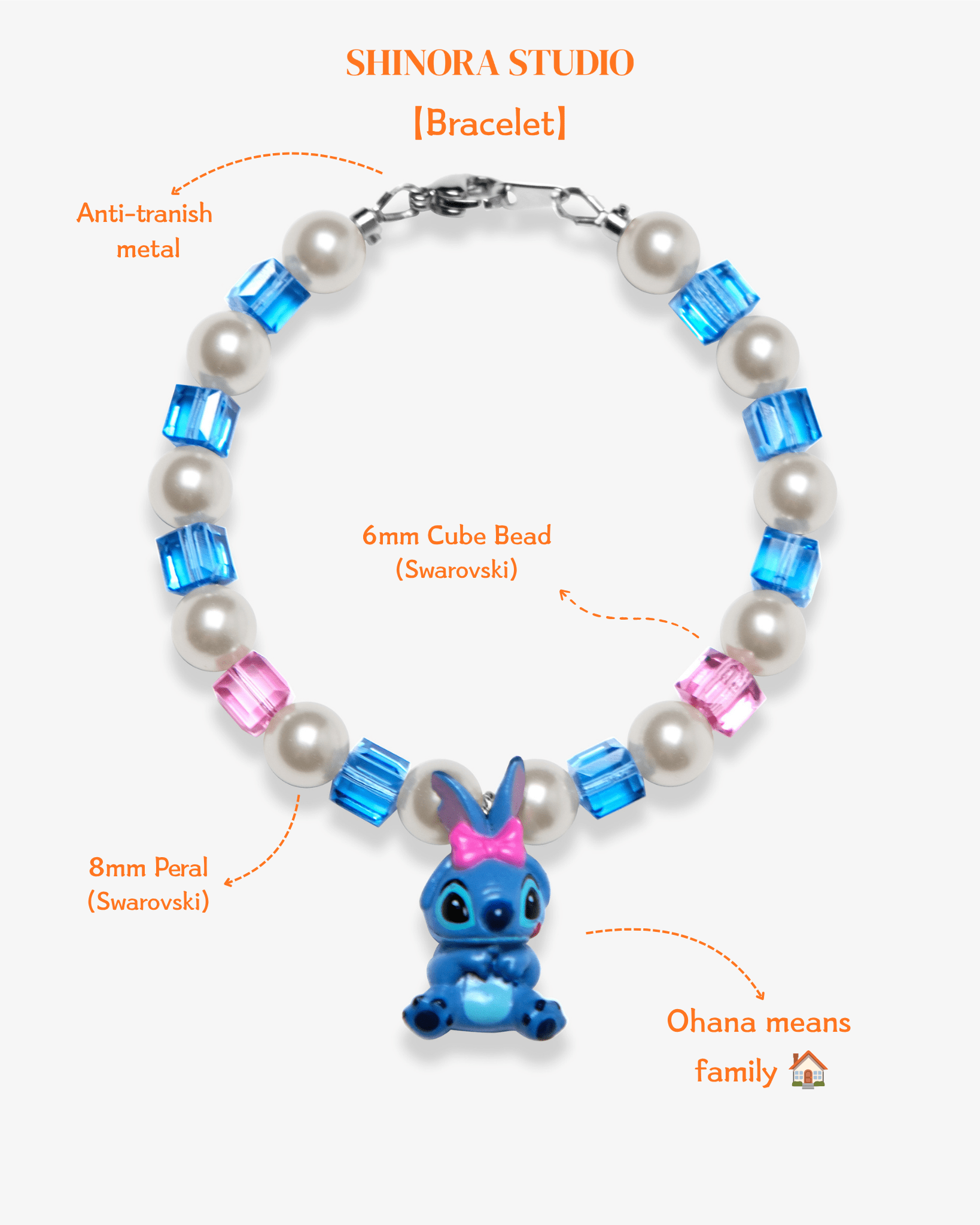 Close-up detail of Blue Bow Character Charm Bracelet · handmade Swarovski crystal jewelry