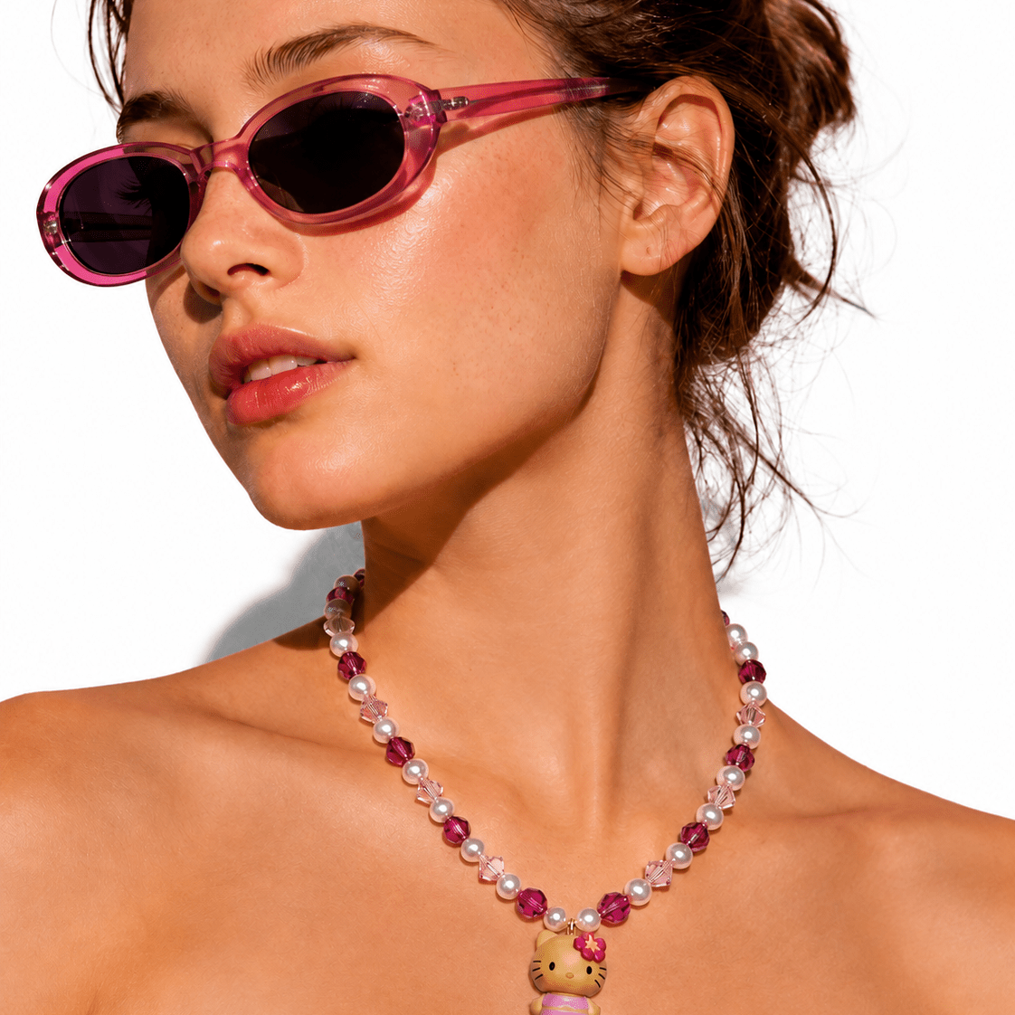Product photo of Pink Pearl Cat Charm Necklace by Shinora Studio.