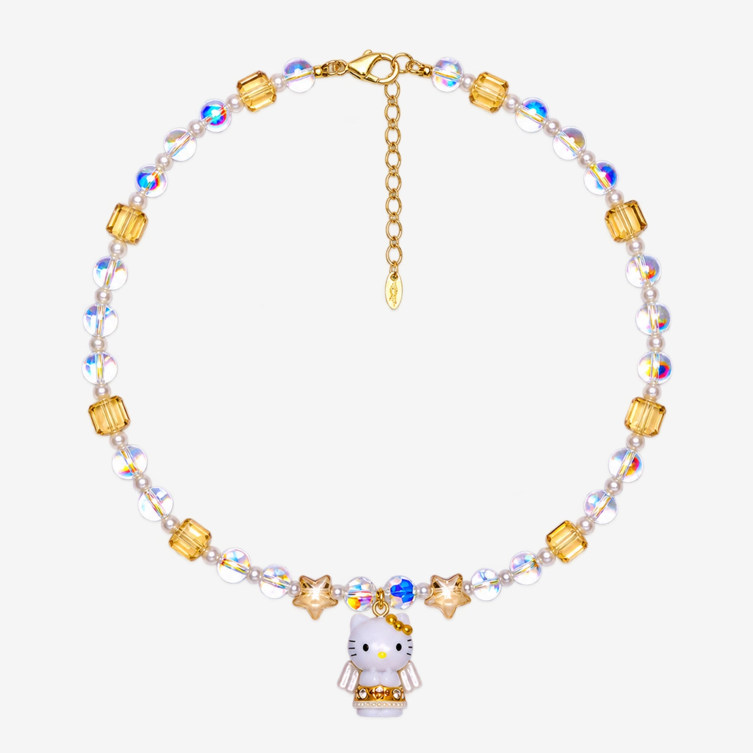 Champagne crystal necklace with iridescent beads, small pearl accents, star beads and a winged cat charm laid flat.