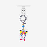 Detachable phone charm with a yellow goggled figure riding a white unicorn, colorful crystals and a silver-tone ring.
