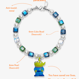 Close-up detail of Cosmic Alien Charm Bracelet · handmade Swarovski crystal jewelry