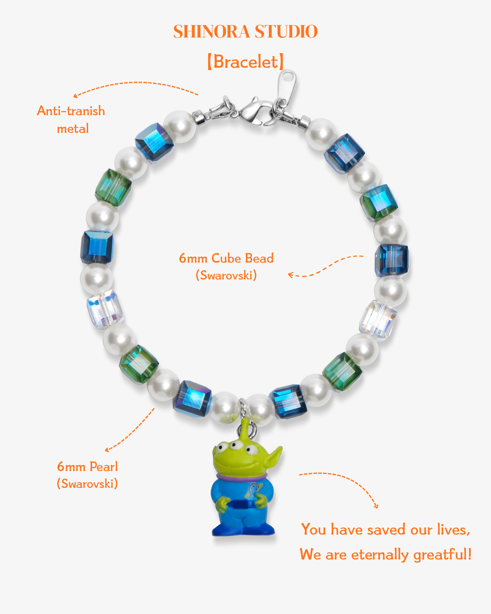 Close-up detail of Cosmic Alien Charm Bracelet · handmade Swarovski crystal jewelry