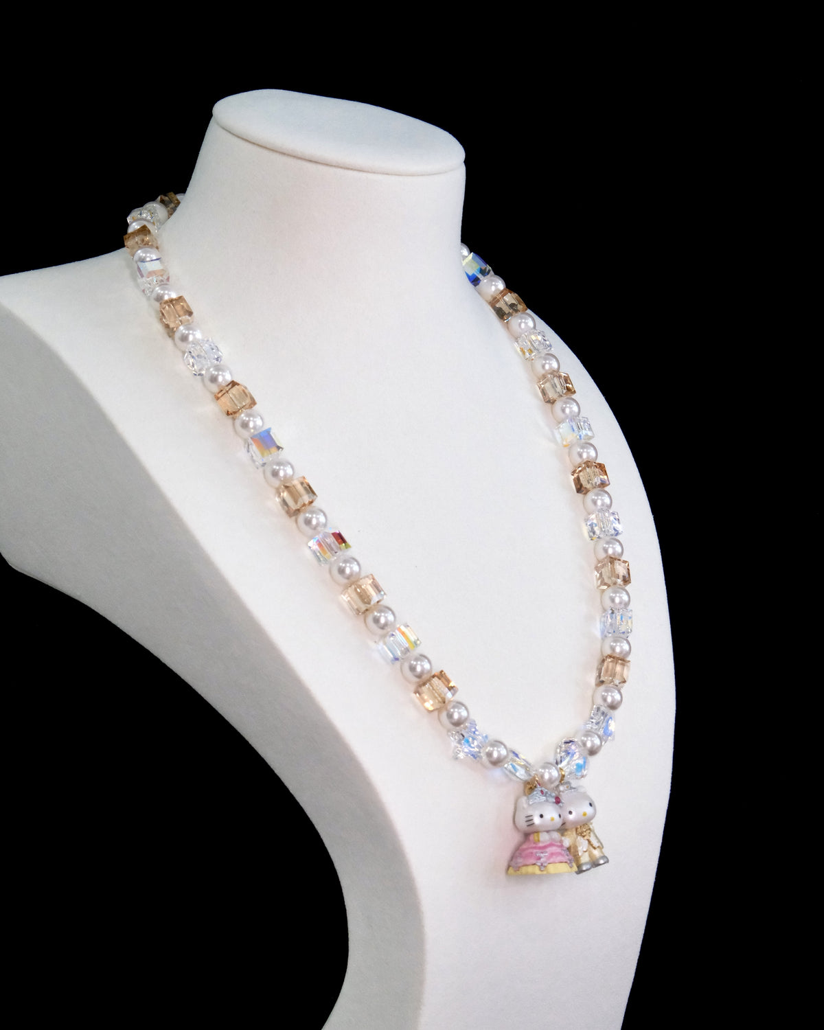 Model wearing handmade crystal charm necklace with Swarovski pearls - unique wedding jewelry
