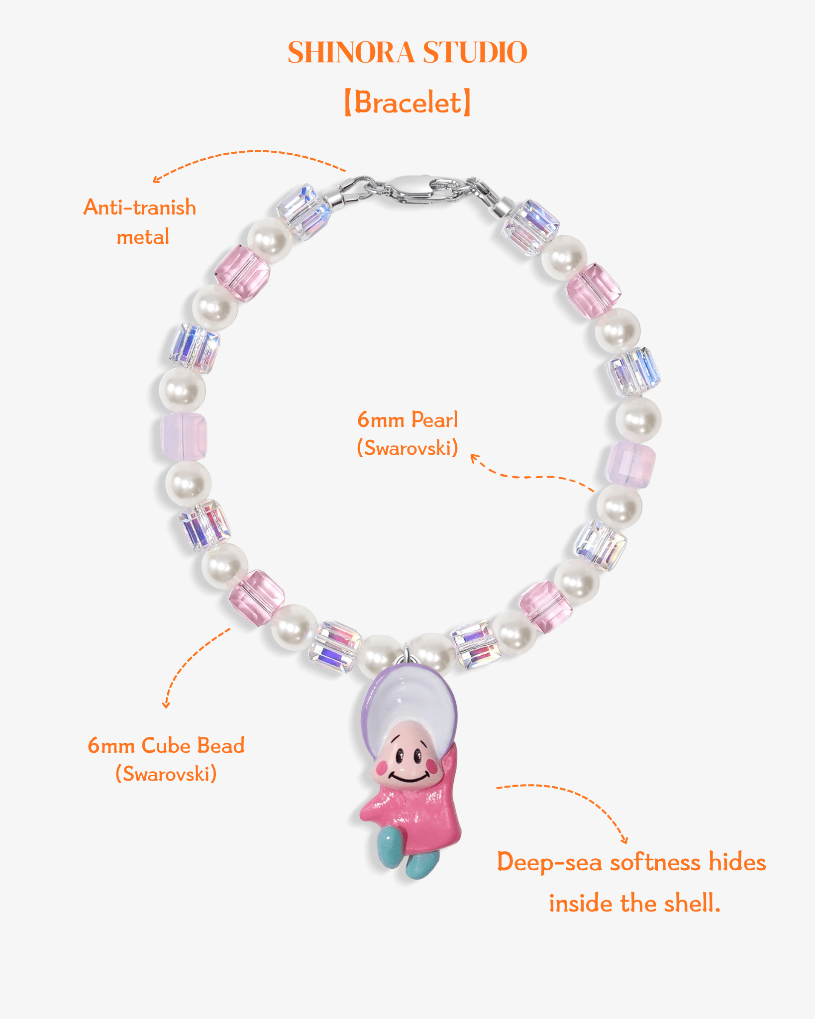 Close-up detail of Pearl Baby Charm Bracelet · handmade Swarovski crystal jewelry