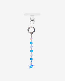Straight phone chain with blue cube crystals, clear faceted accents and a blue star crystal, shown below a silver-tone ring.