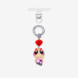 Detachable phone charm with a pink cartoon girl figure, red heart crystal, pink crystal accent and a silver-tone ring.
