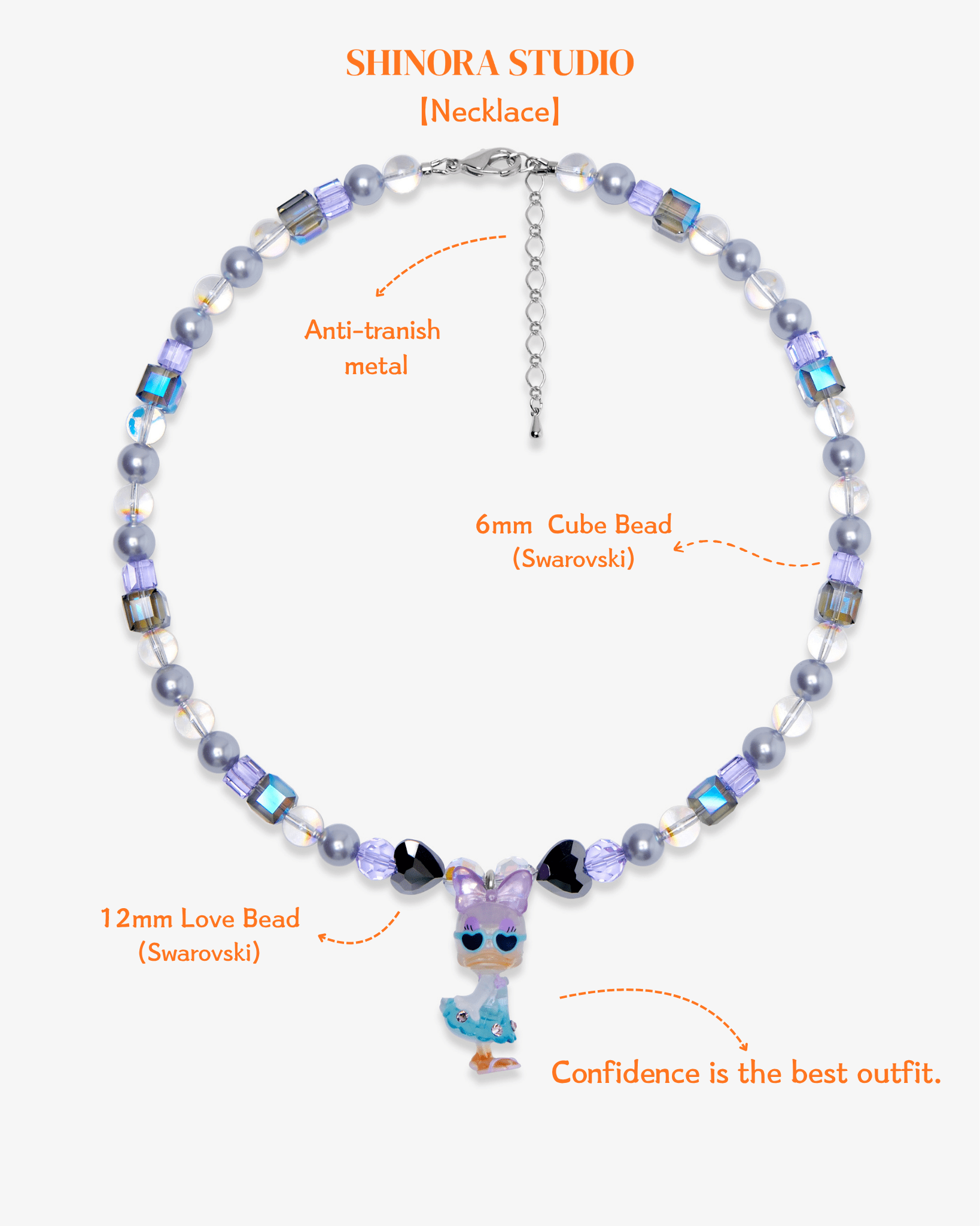 Close-up detail of Lavender & Blue Duck Charm Necklace · handmade Swarovski crystal jewelry