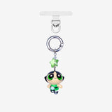 Detachable phone charm with a green cartoon girl figure, green star crystal, clear crystal accents and a silver-tone ring.
