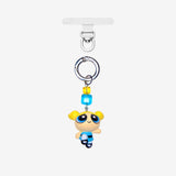 Detachable phone charm with a blue cartoon girl figure, yellow and turquoise crystals and a silver-tone ring.