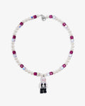 Handmade pastel Swarovski crystal and pearl charm necklace with vintage pendant - flat lay
