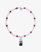 Handmade pastel Swarovski crystal and pearl charm necklace with vintage pendant - flat lay