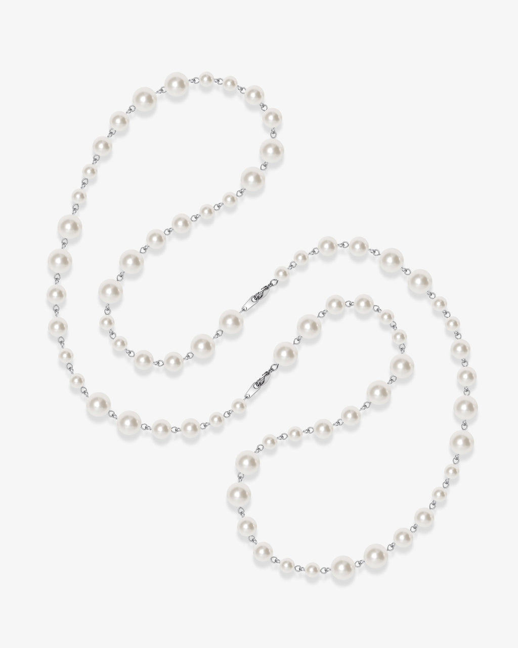 Handmade Swarovski pearl necklace opera length with graduating white pearls and silver chain - flat lay