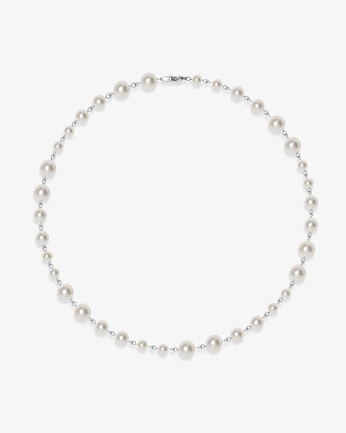 Handmade Swarovski pearl necklace petite length with white pearls and silver chain - flat lay