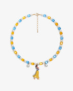 Handmade red blue and yellow Swarovski crystal and pearl charm necklace with vintage pendant - flat lay