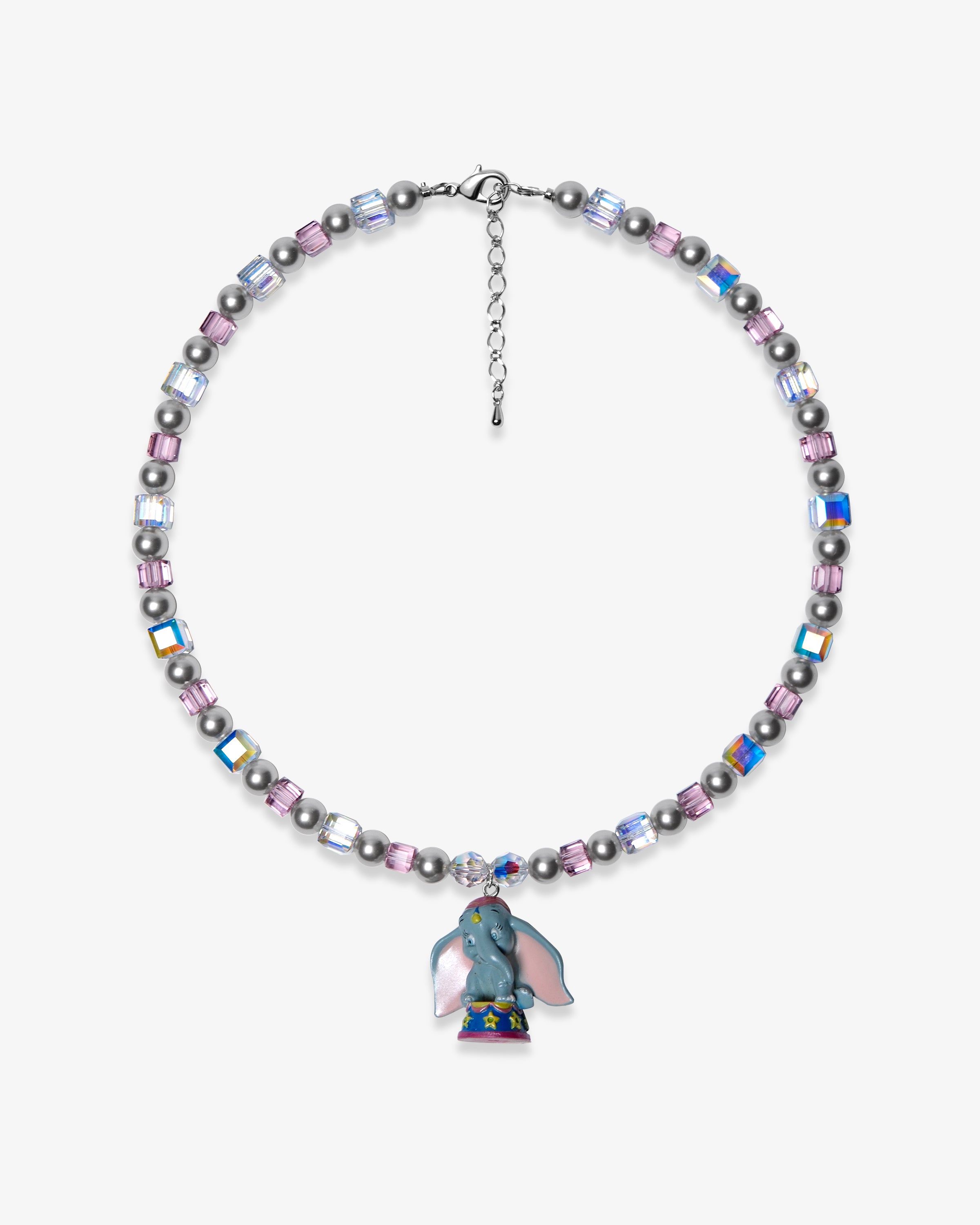 Studio product photo of a handmade blue elephant charm necklace with gray Swarovski pearls, pink beads, and iridescent crystal accents.