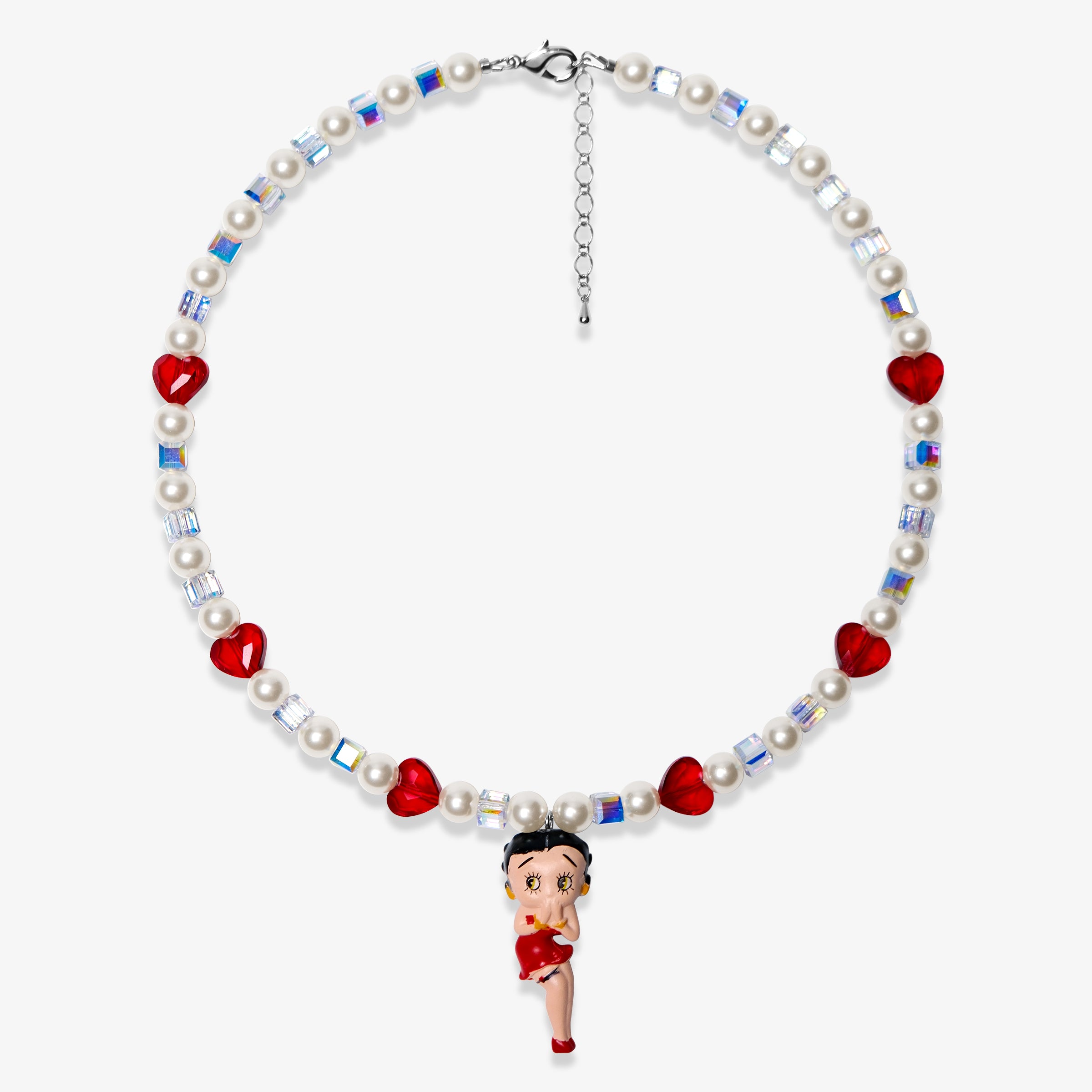Studio product photo of a handmade red heart charm necklace with white Swarovski crystal pearls and iridescent cube beads.