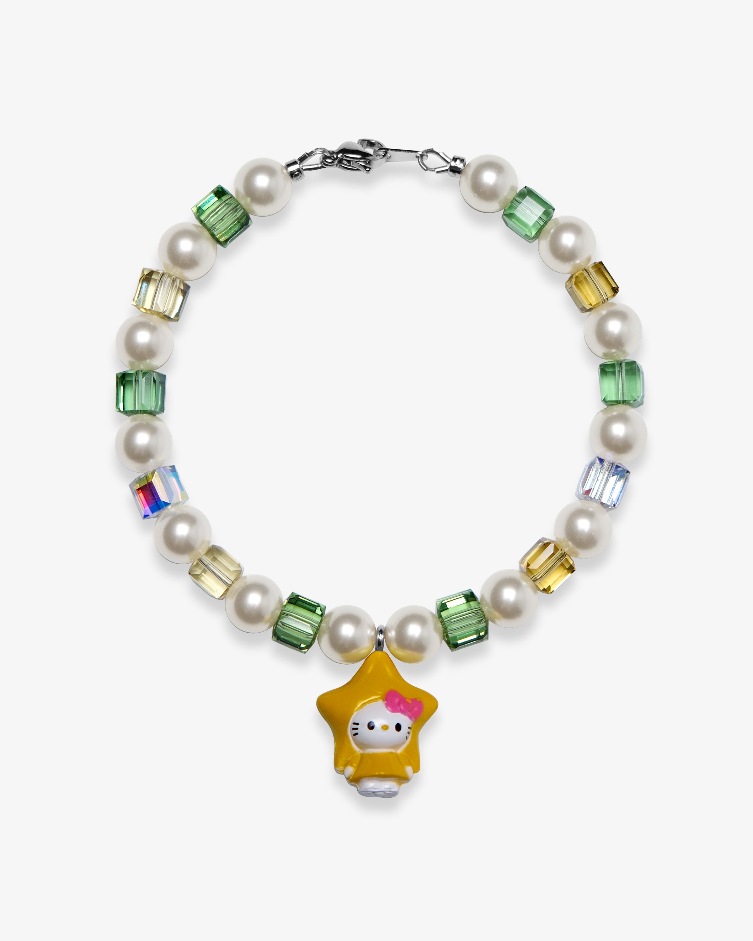 Studio product photo of a handmade yellow star charm bracelet with white Swarovski pearls and green, gold, and iridescent crystal beads.