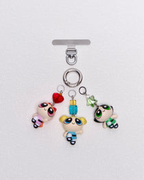 Product photo showing Vintage trio character phone charm set with colorful Swarovski crystal accents and silver-tone phone hardware.