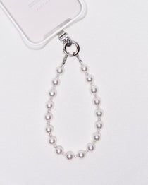 Product photo showing Handmade Swarovski pearl and crystal phone chain with silver-tone phone hardware.