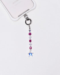 Product photo showing Purple Swarovski crystal straight phone chain with a star charm and silver-tone phone hardware.
