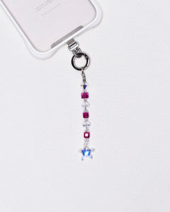 Product photo showing Purple Swarovski crystal straight phone chain with a star charm and silver-tone phone hardware.