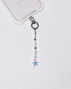 Product photo showing White Swarovski crystal straight phone chain with a star charm and silver-tone phone hardware.