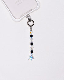Product photo showing Black Swarovski crystal straight phone chain with a star charm and silver-tone phone hardware.