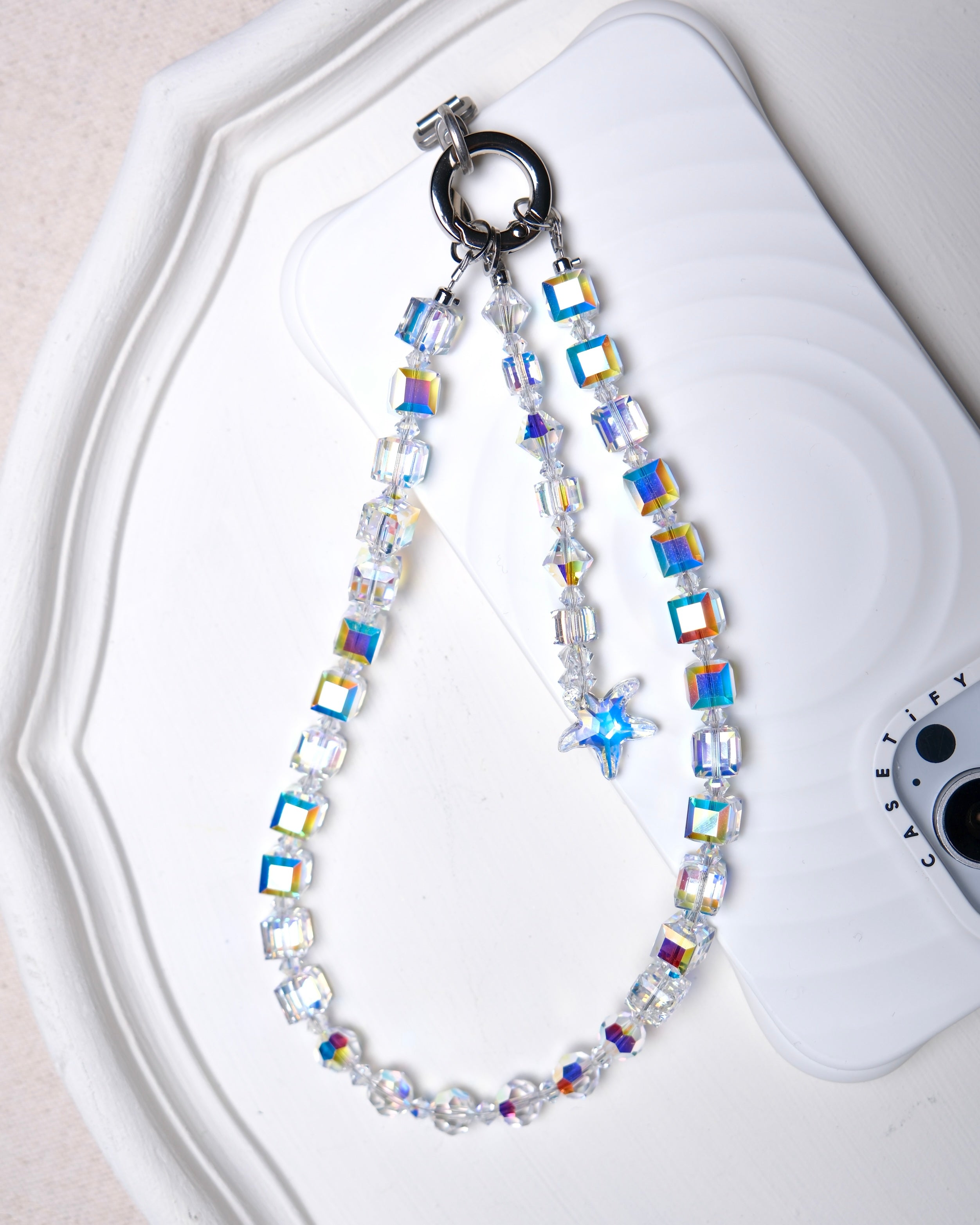 Aurora Borealis Swarovski crystal phone chain with a star charm and silver-tone phone tab