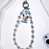 Detail product photo of a gray Swarovski pearl phone chain with white crystal accents.