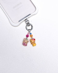 Tropical cat duo vintage phone charm with pink and orange Swarovski crystal accents and silver-tone hardware
