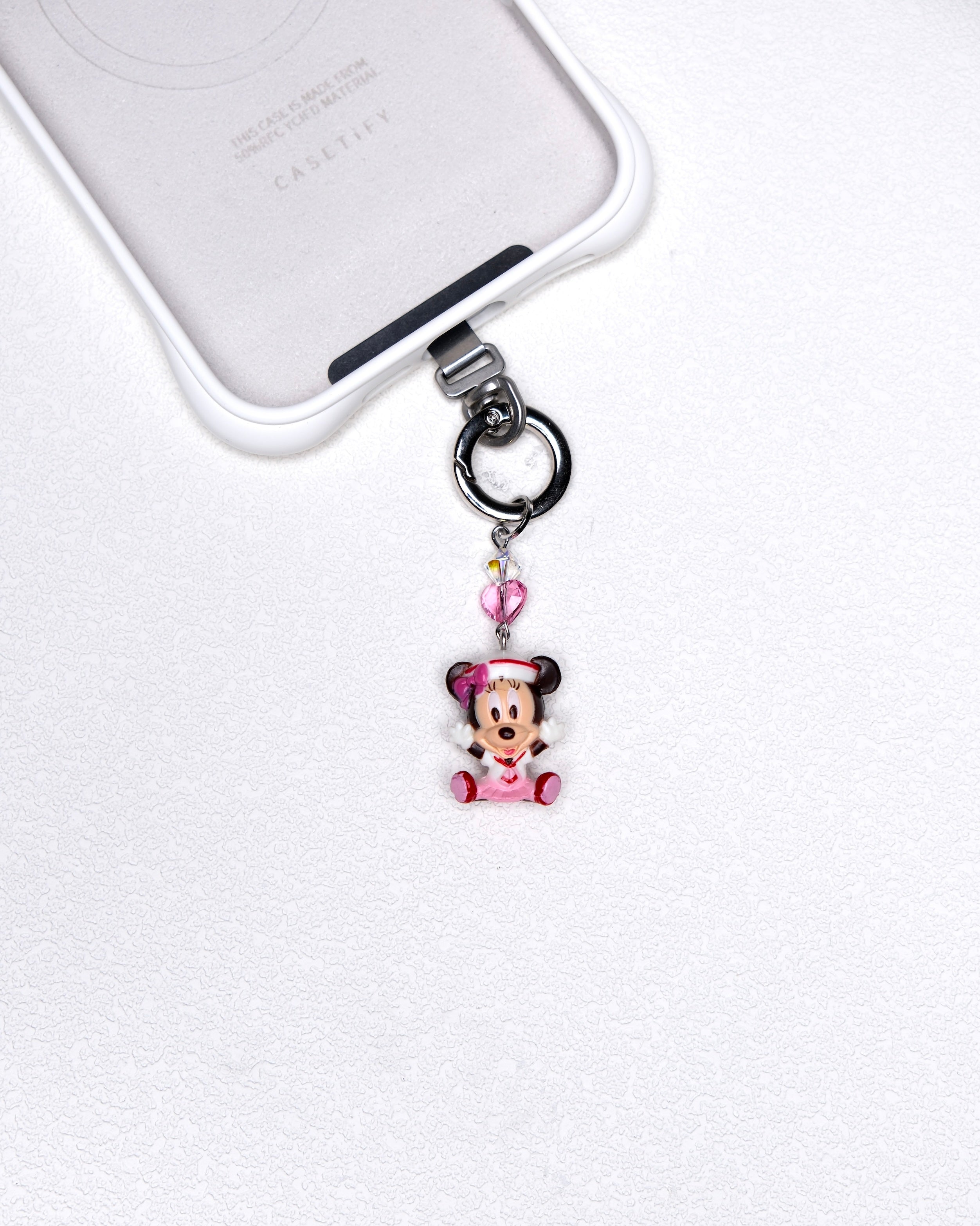 Pink heart vintage character phone charm with pink and clear Swarovski crystal accents and silver-tone hardware