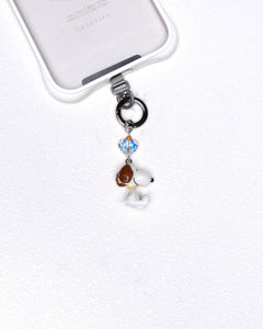 Product photo of a vintage dog phone charm with a Swarovski crystal heart accent.