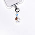Product photo of a vintage dog phone charm with a Swarovski crystal heart accent.