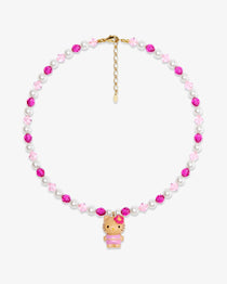 Product photo of a pink pearl cat charm necklace with white pearls, pink crystals, and gold-tone hardware.