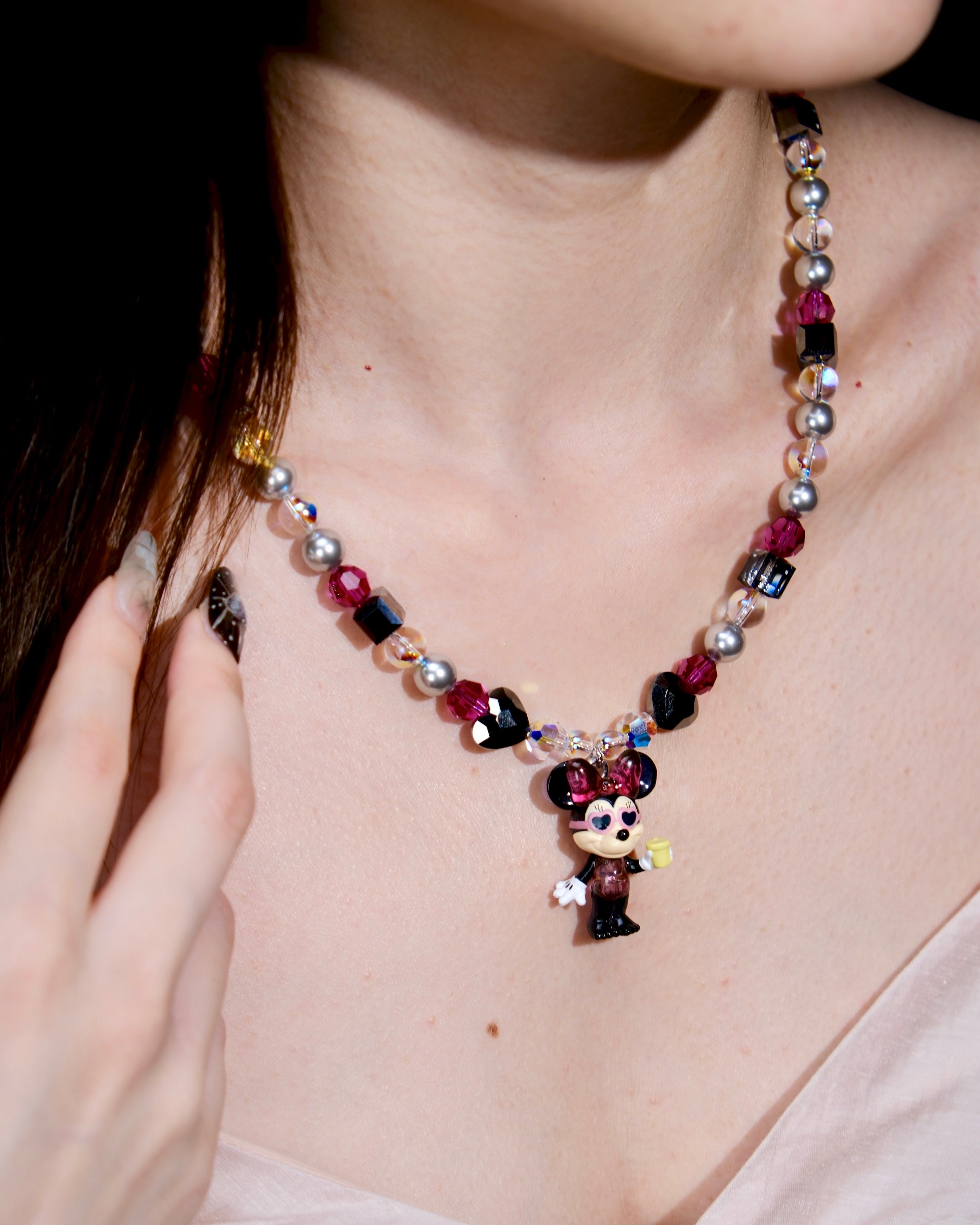 Additional product photo of a pink and silver mouse charm necklace with gray pearls and pink crystal beads.