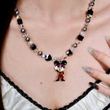 Additional product photo of a black and silver mouse charm necklace with gray pearls and black crystal beads.