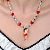 Detail product photo of Red Heart Charm Swarovski Necklace by Shinora Studio.