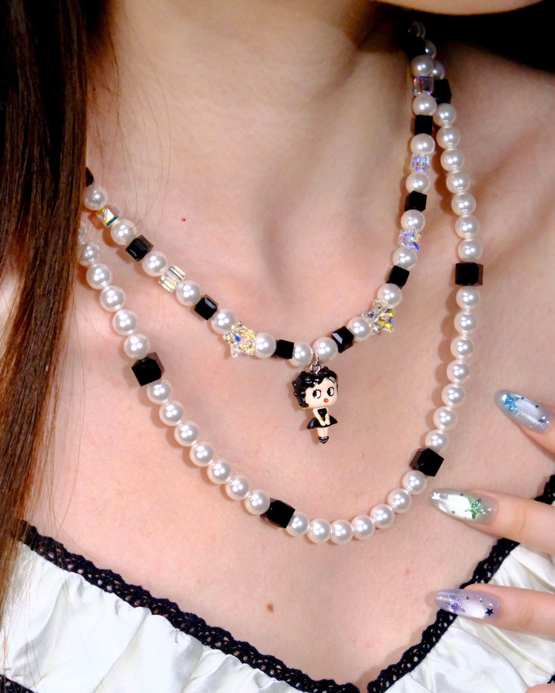 Detail product photo of Black&White Pearl Charm Necklace by Shinora Studio.