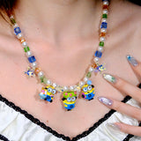 Detail product photo of Sunshine Trio Charm Necklace by Shinora Studio.