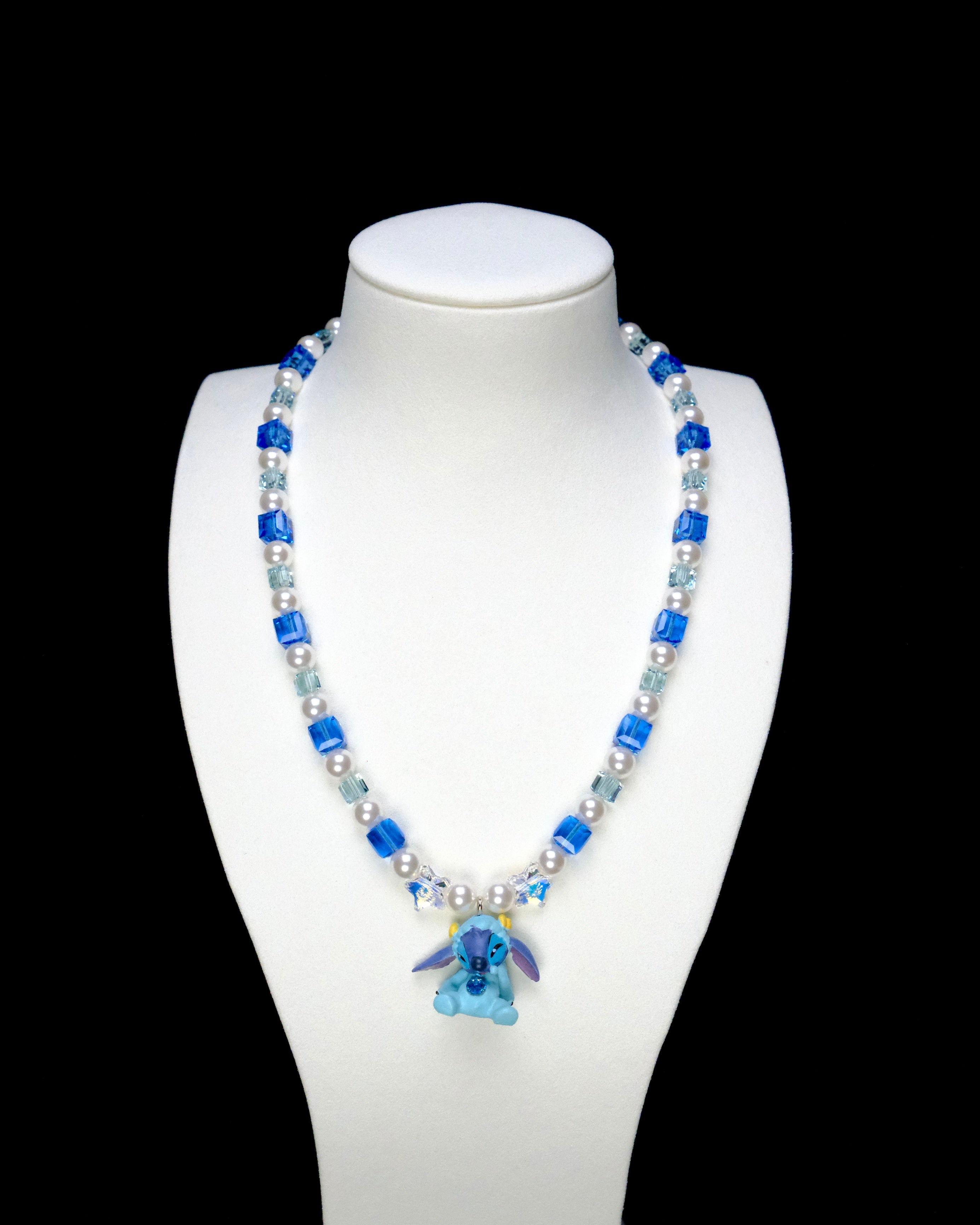 Product photo of Blue Creature Necklace by Shinora Studio.
