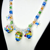 Alternate product photo of Sunshine Trio Charm Necklace by Shinora Studio.